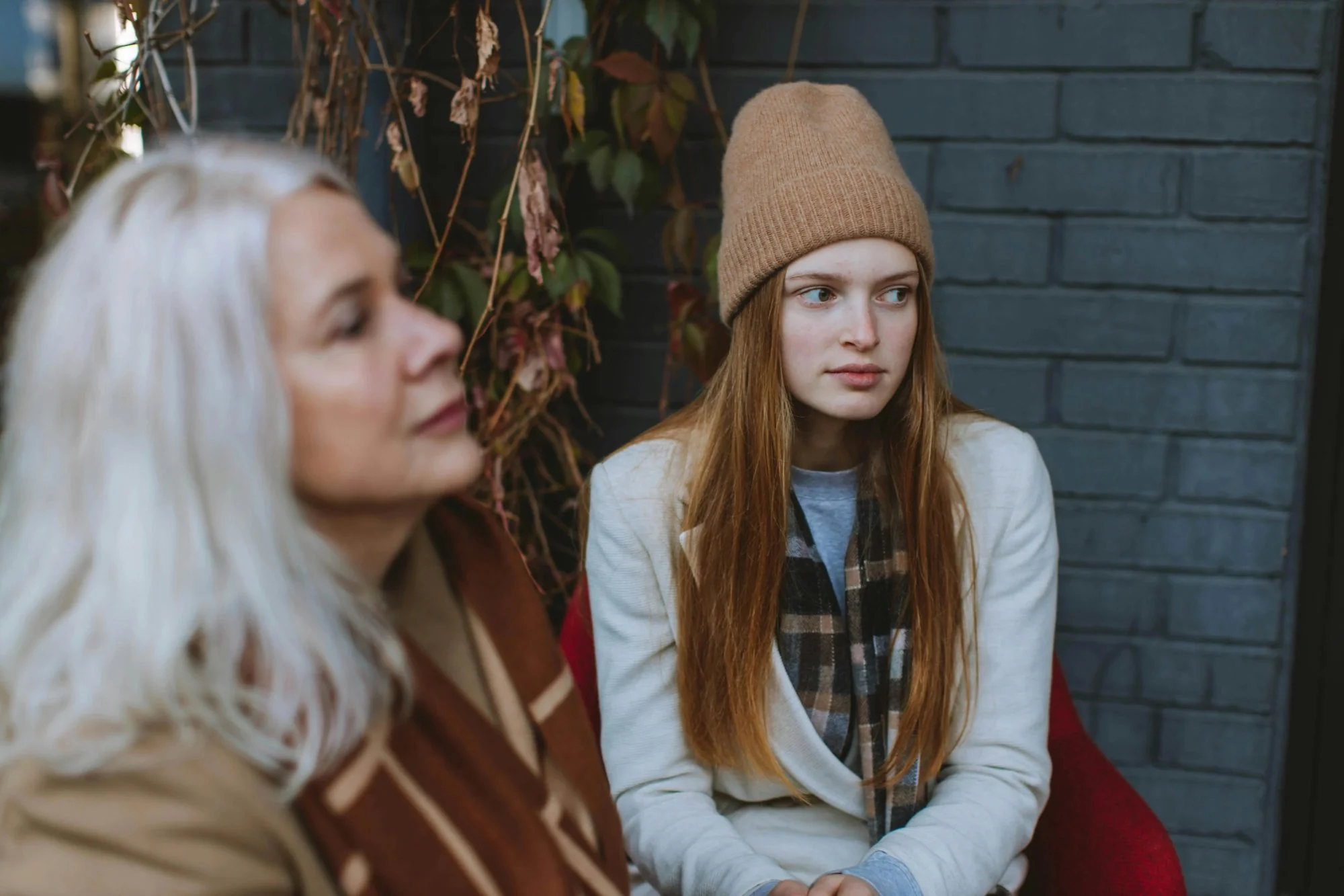 Parent and school administrator seated at a meeting table reviewing documents — representing the FAPE standard in special education