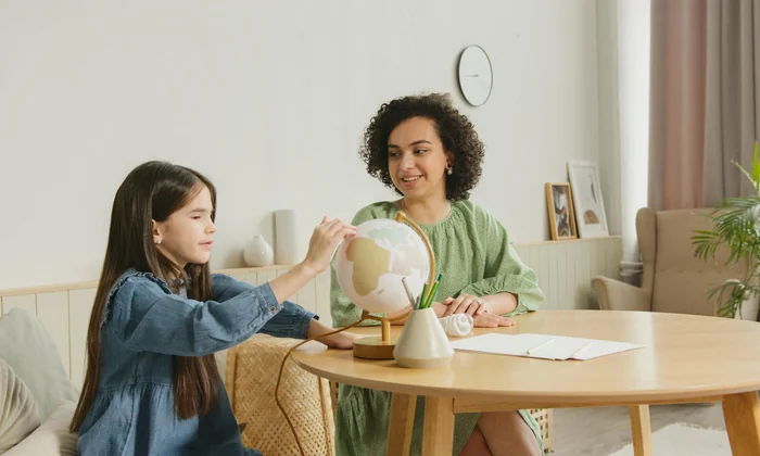 Speech-language pathologist working with a child