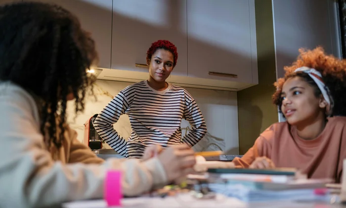 Parent and administrator in a serious IEP discipline meeting