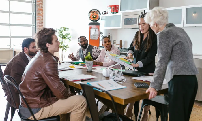 Group of parents and professionals at an IEP meeting